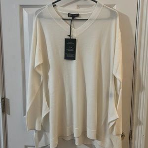 White sweater, size medium